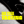 A black and white photograph of a wine bottle lying diagonally on a textured wooden surface, with large bold yellow text reading 'BACK VINTAGE TASTING' overlaid across the center.